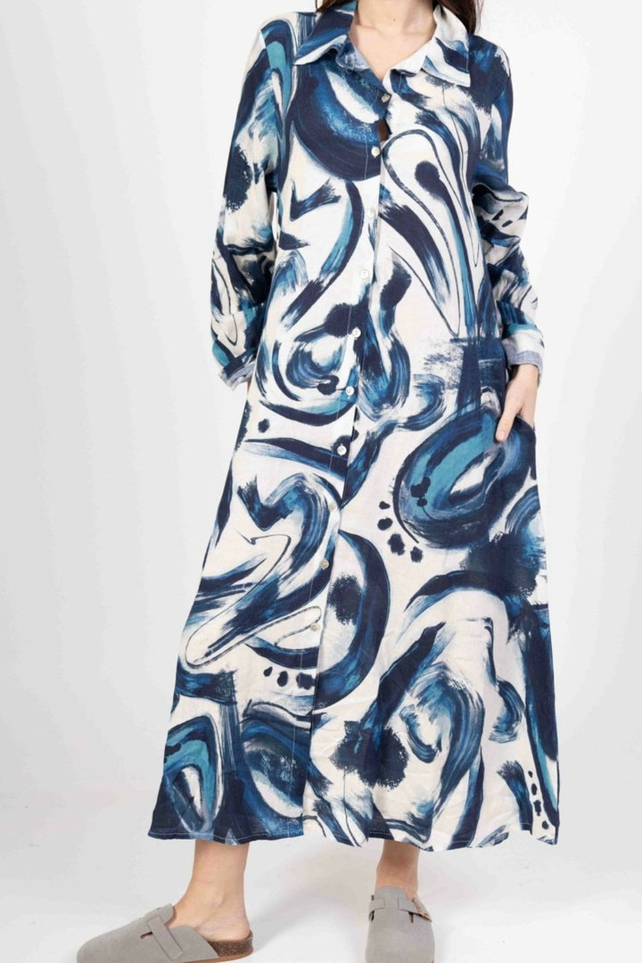 Women's long Italian linen dress in natural color, featuring sleeveless design and relaxed fit