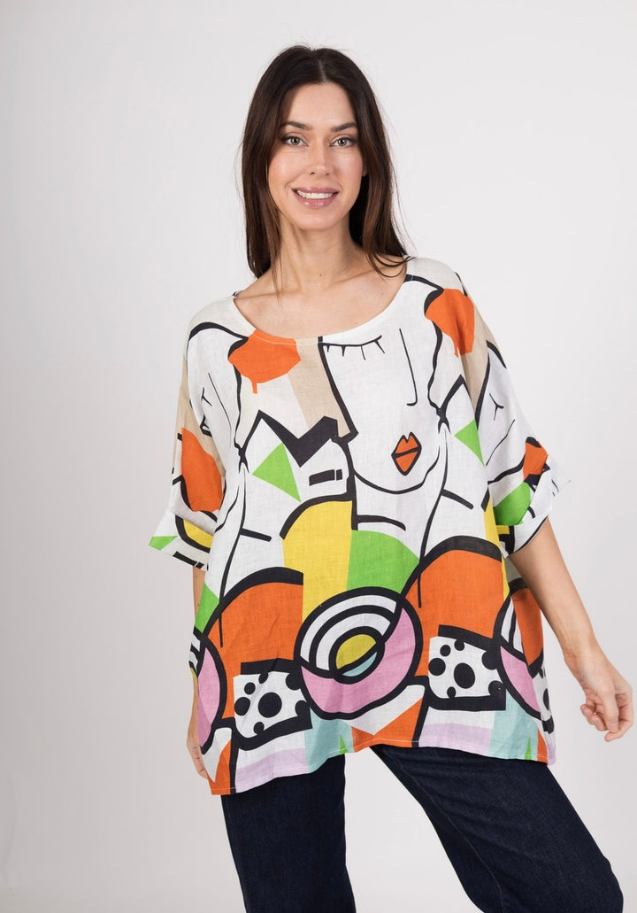 Side view of women's linen top showcasing artistic Picasso print and breezy silhouette.