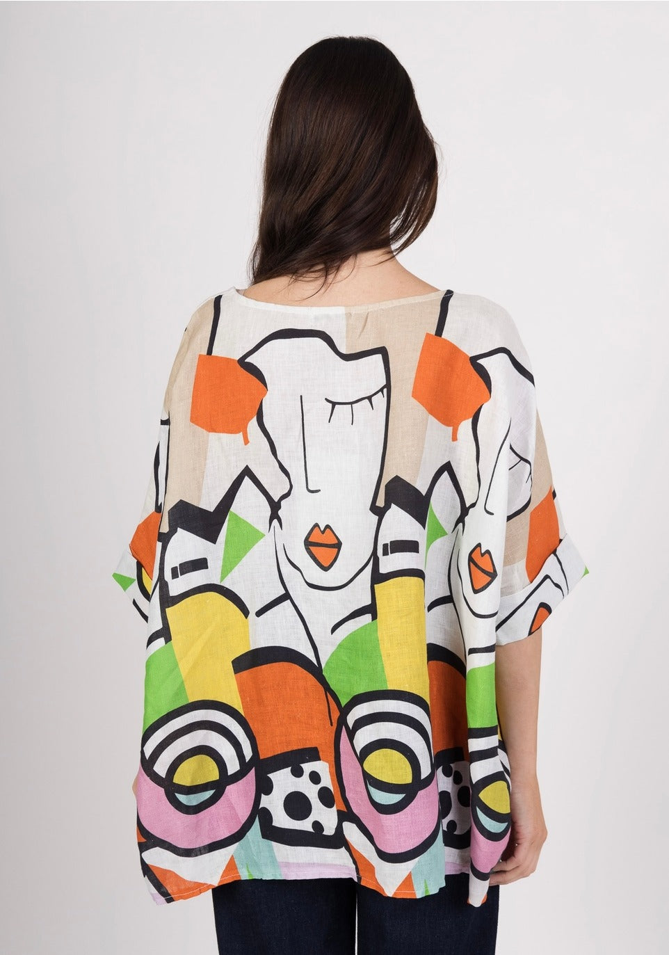 Back view of Italian-made linen blouse with vibrant Picasso-inspired design and relaxed fit