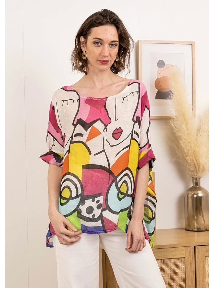 Women's Italian pink linen top featuring vibrant Picasso-inspired abstract print and relaxed fit