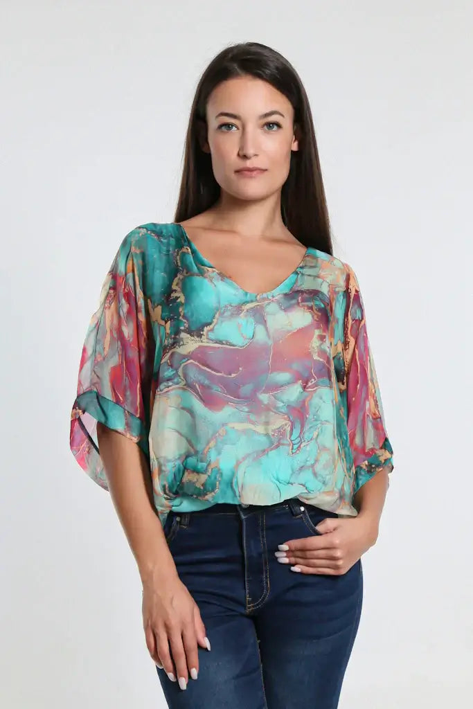 Tiffany blue silk blouse with marble print, sheer elbow-length sleeves, and banded waist – made in Italy