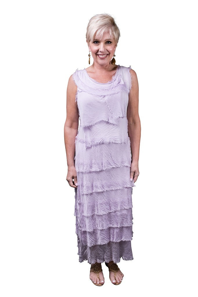 Lilac silk maxi dress featuring layered ruffles, scoop neckline, and flowing, romantic silhouette