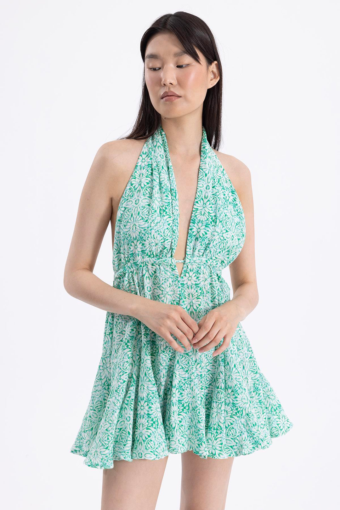 Green mini dress featuring flared hem, square neckline, and sleeveless design – made in Türkiye