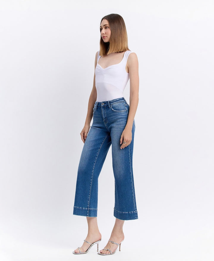 right Side view of high-rise wide-leg cropped jeans featuring relaxed fit and slightly frayed hem