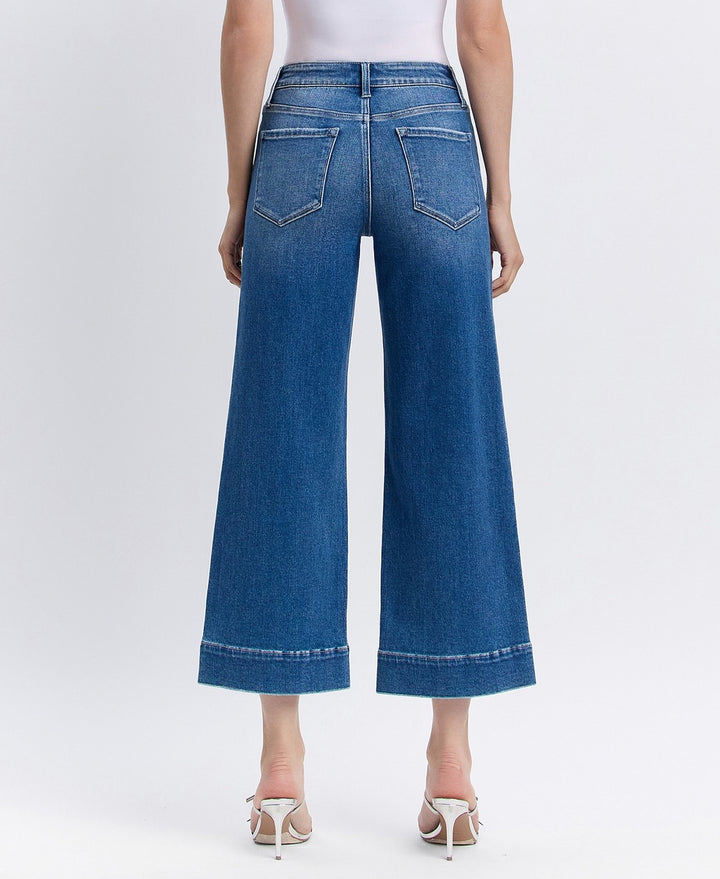 close Back view of light blue crop wide-leg jeans with classic back pockets and comfortable rise