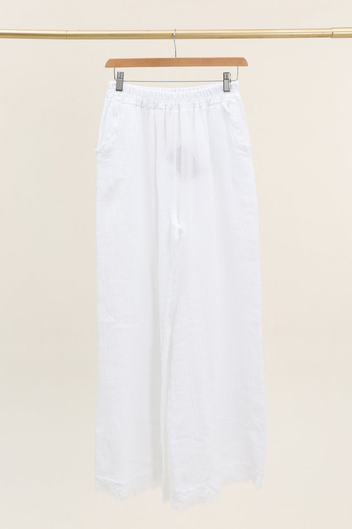 white Italian linen pants featuring relaxed fit and breathable fabric – made in Italy