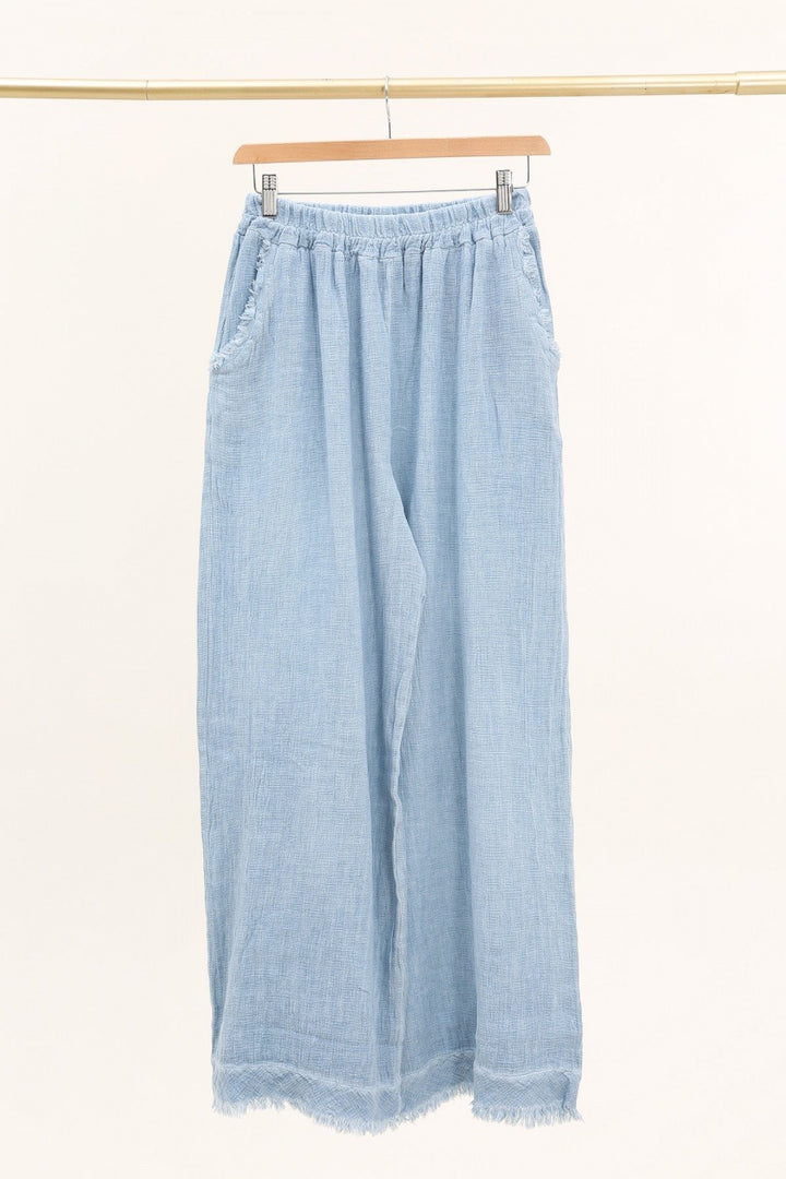 lihgt blue Italian linen pants featuring relaxed fit and breathable fabric – made in Italy