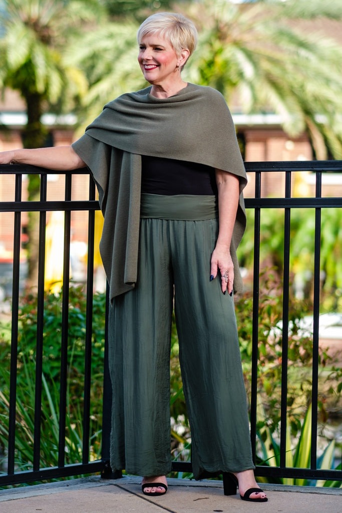 Army green silk pants with wide-leg cut and foldover waistband – flowy and elegant fit.