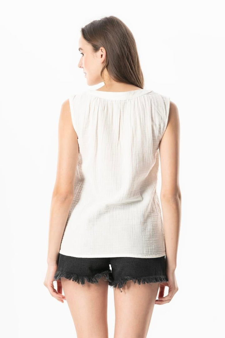 Back view of  off white cotton gauze top by ADEA