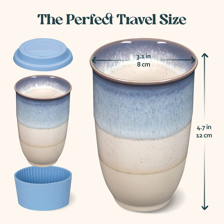 Blue and beige ceramic travel mug with measurements on a white background