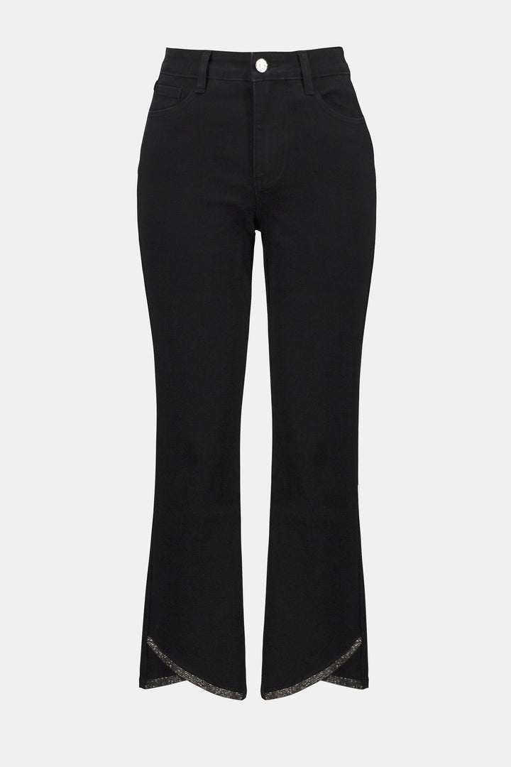 Black flared pants on a light gray background