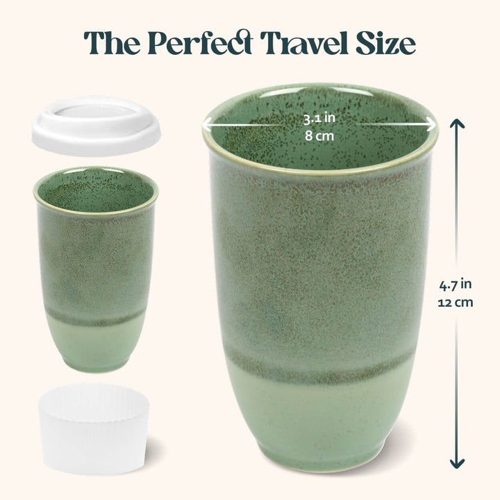 Green ceramic travel mug with measurements on a white background