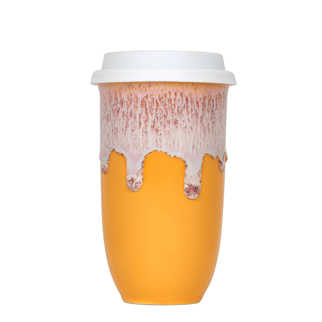 Yellow cup with a white lid on a white background