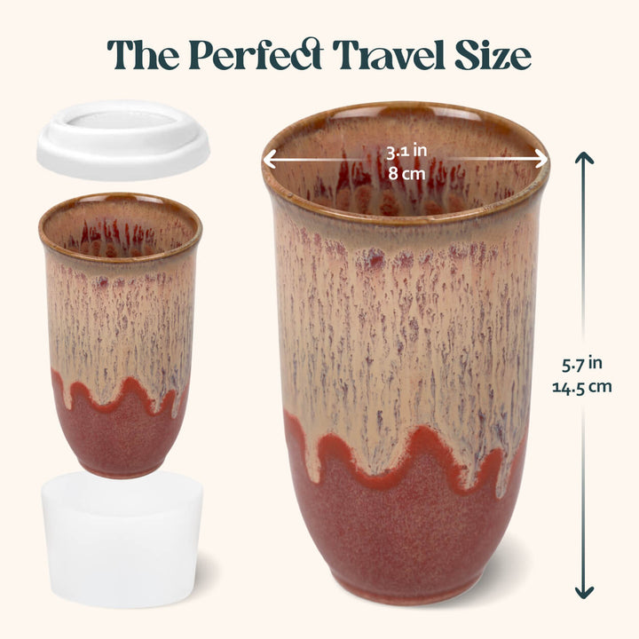 Ceramic travel mug with dimensions labeled on a white background