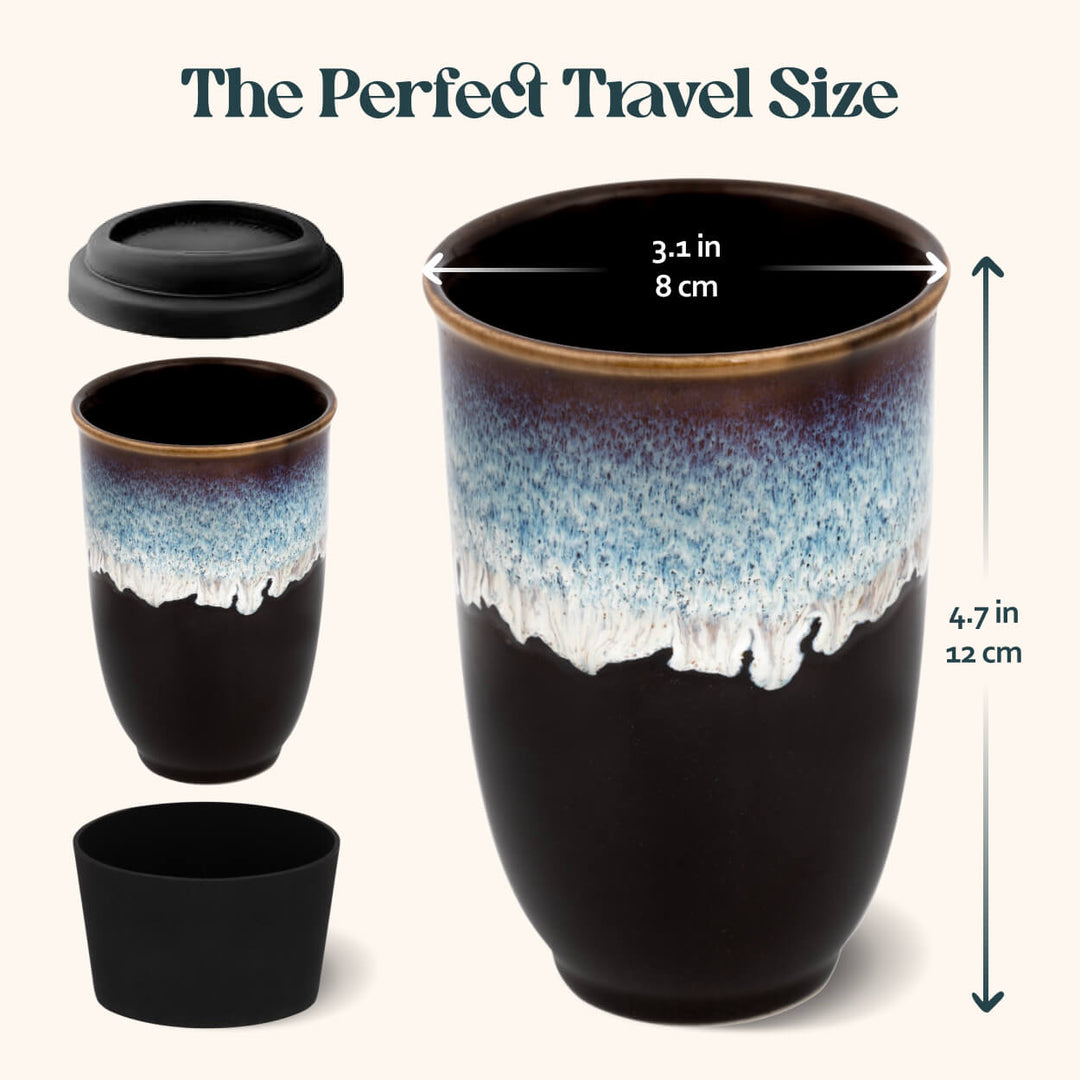 Black ceramic tumbler with gradient design and measurement details on a white background