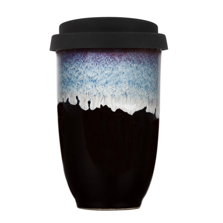 Black ceramic tumbler with gradient design on a white background