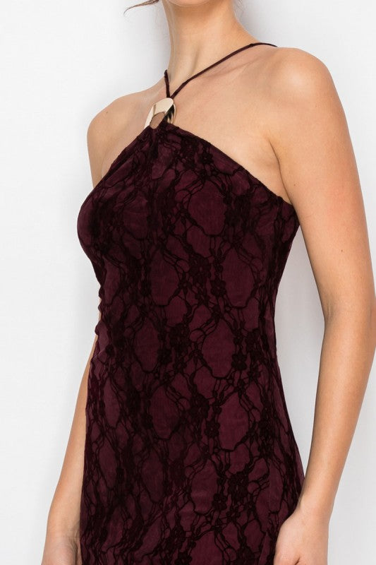 Maroon lace halter neck dress on a white background