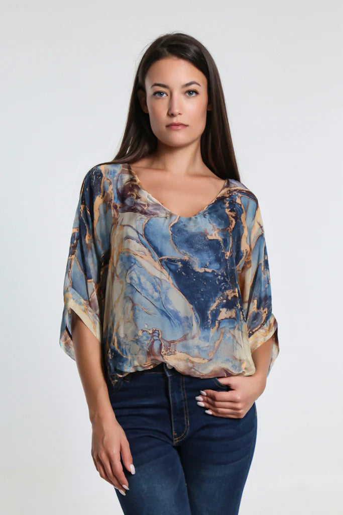 Navy blue silk blouse with marble print, sheer elbow-length sleeves, and banded waist – made in Italy