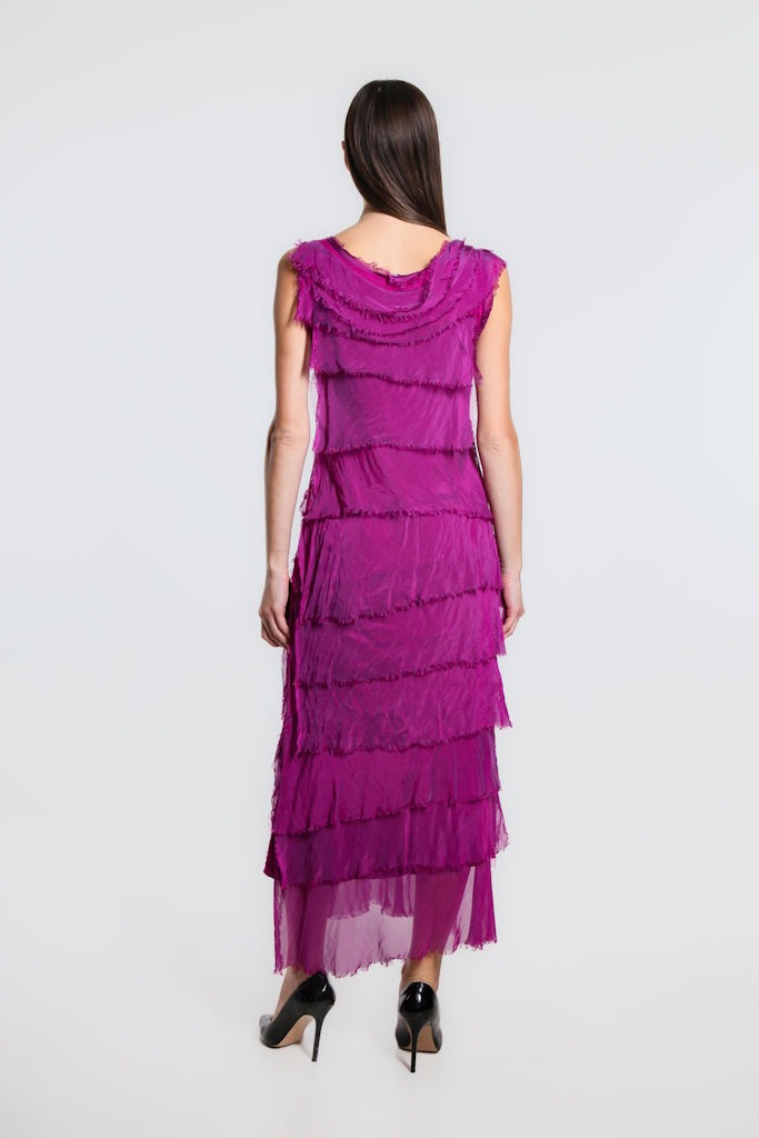 Back view of army green silk maxi dress featuring tiered ruffles and effortless, elegant flow