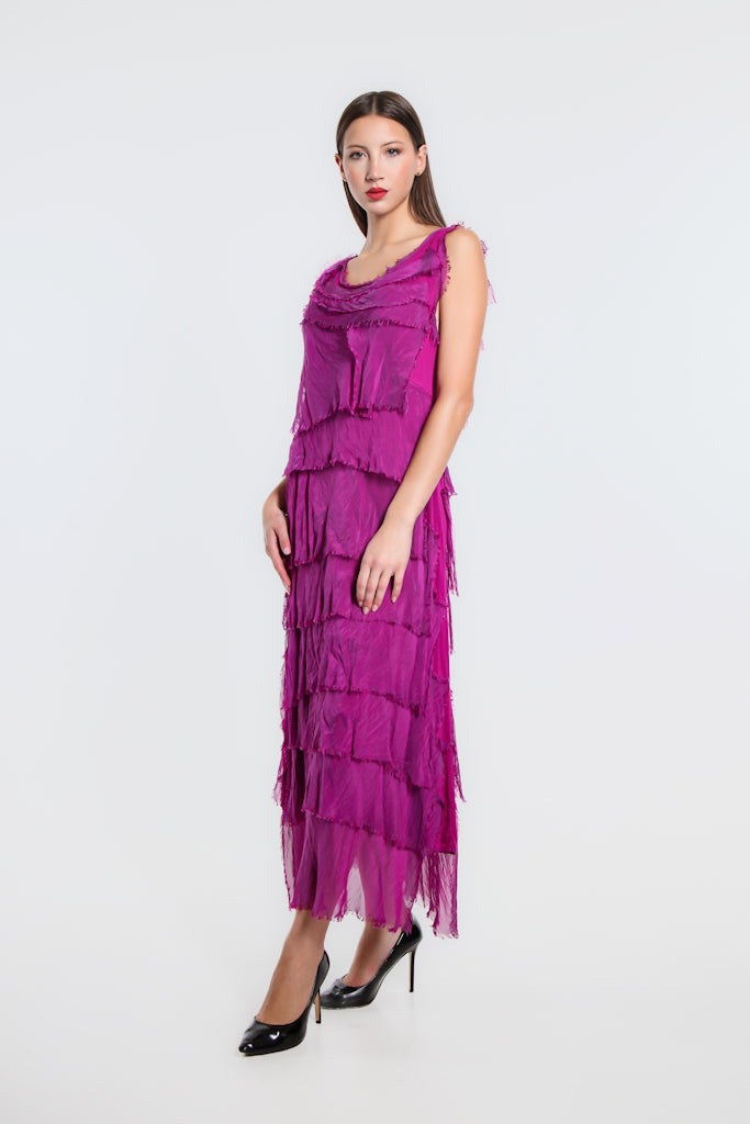 Side view of purple silk maxi dress with cascading ruffle layers and breezy movement