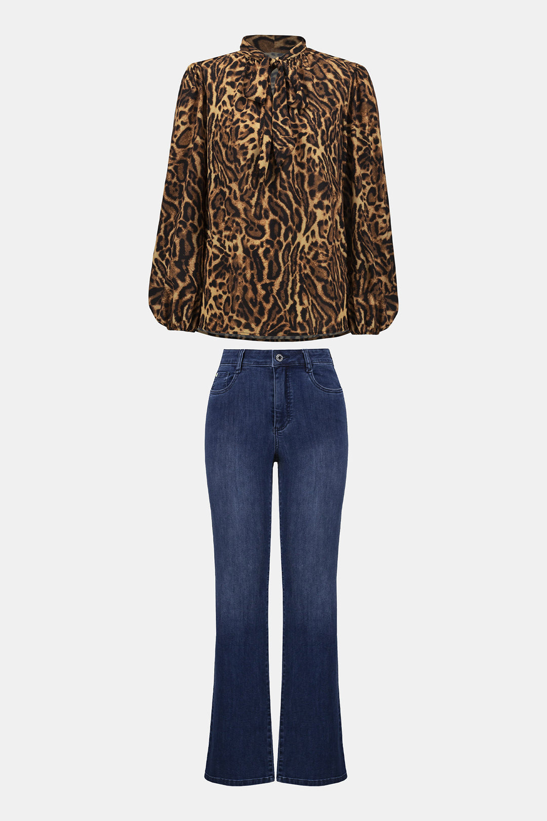 Leopard print blouse and blue jeans on a white background