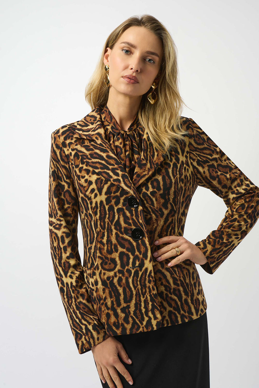 Woman wearing a leopard print jacket on a white background