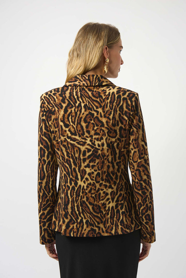 Person wearing a leopard print jacket on a white background