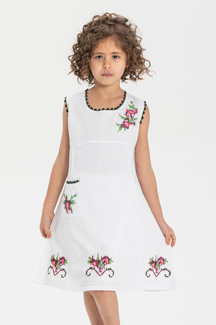 white embroidered sleeveless girls dress